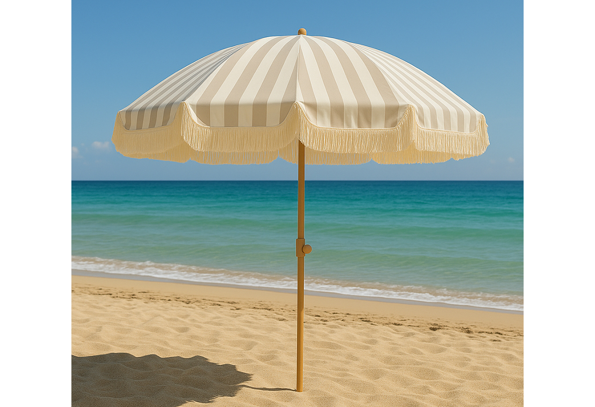 Απεικονίζεται η ομπρέλα στην παραλία.